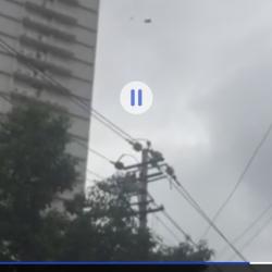 Мужчина сбежал из отеля по телефонному проводу на высоте 19 этажа (ВИДЕО)